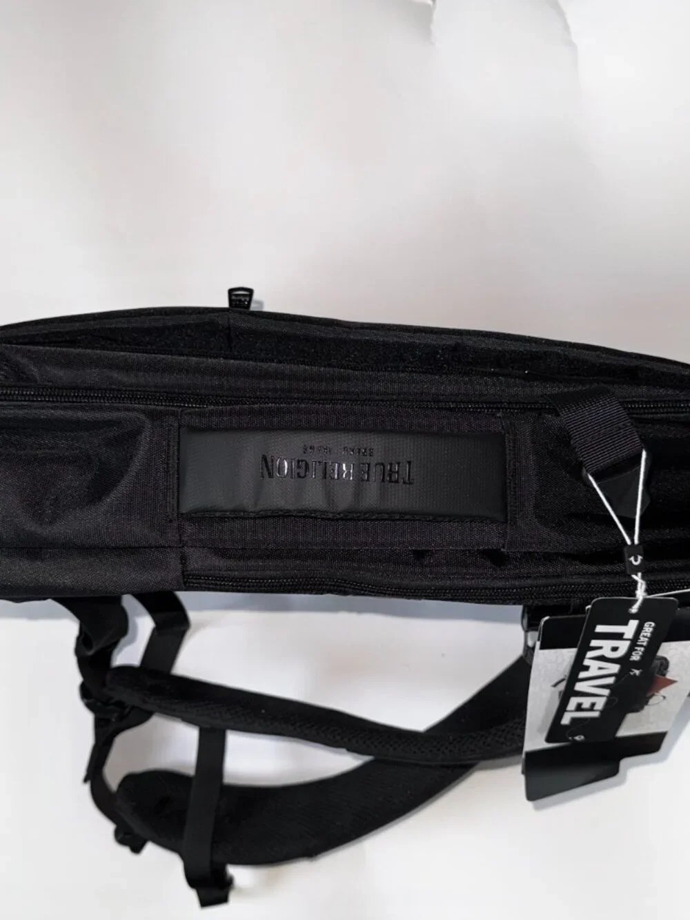 True Religion Will travel backpack in black with a volume of 23 l